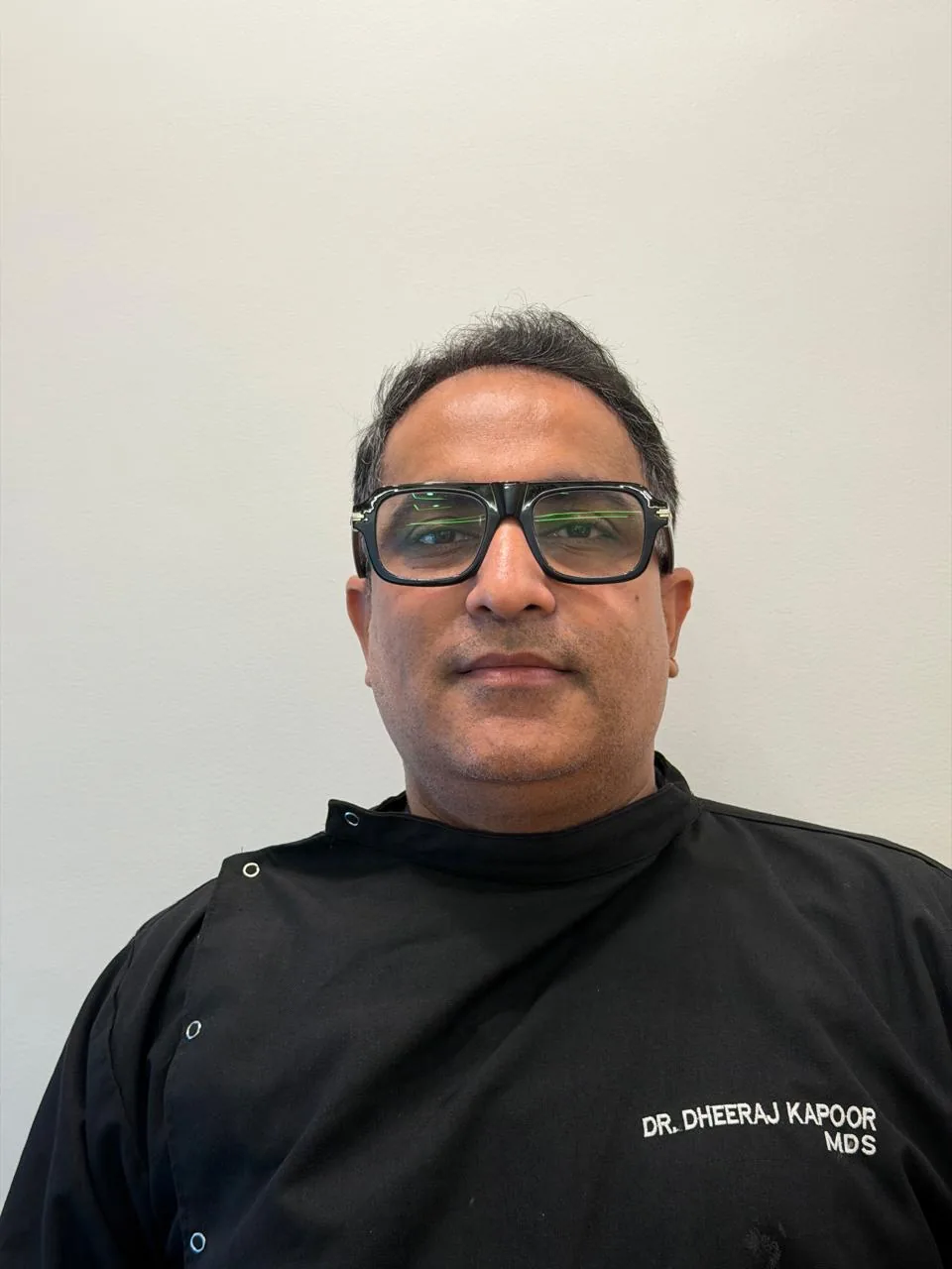 Dr. Dheeraj Kapoor, Prosthodontist at Poly Dental Clinic Mohali